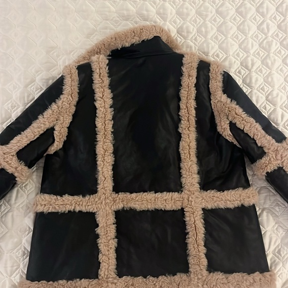 Faux black leather jacket
Seems more like a large. - Picture 6 of 7